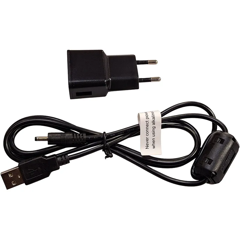 Netz-/Ladegerät für Handscope B mit USB-Kabel und Sicherheitshinweis zu Alkalin-Batterien